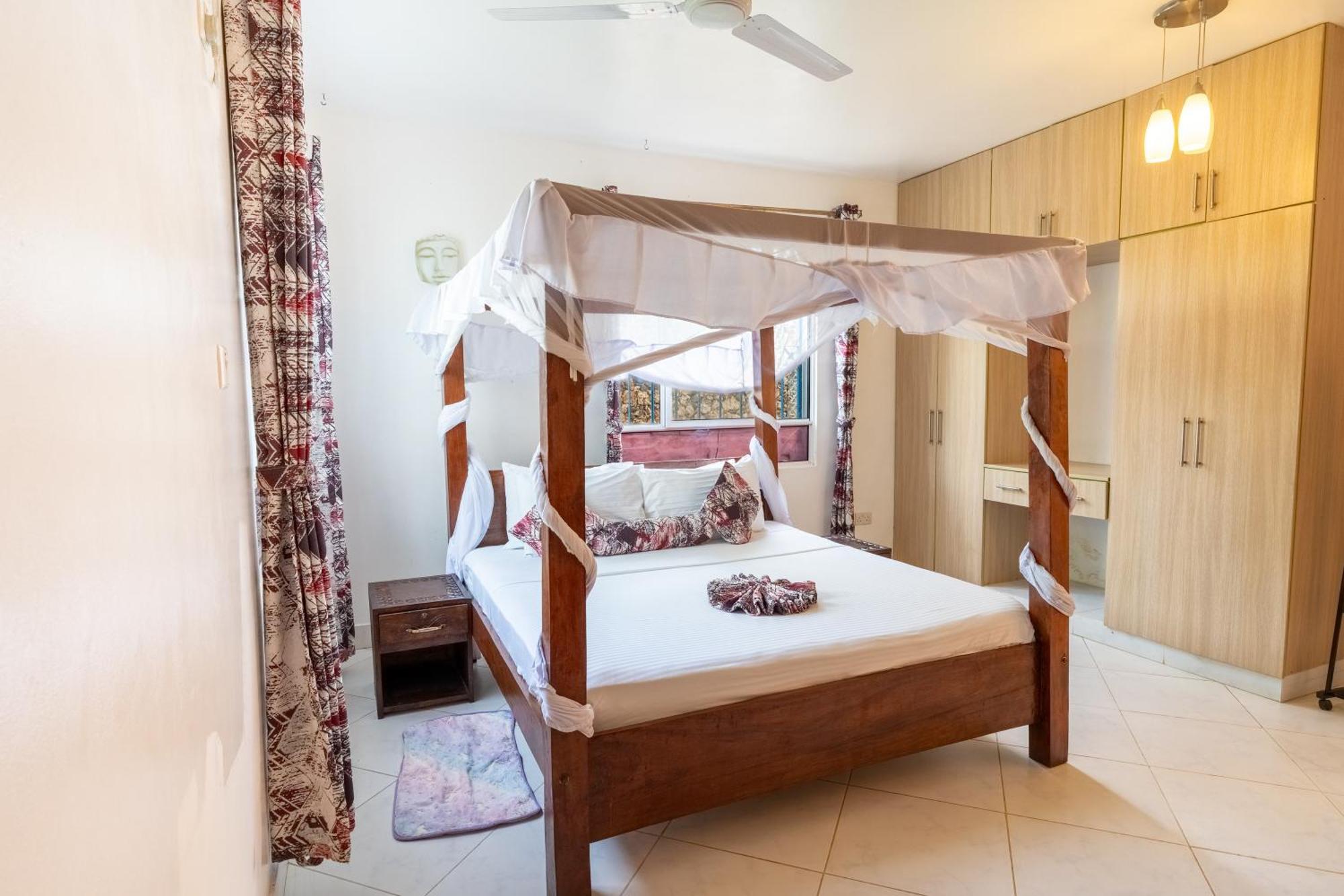 Queens Chateau Boutique Villa เดียนีบีช ภายนอก รูปภาพ