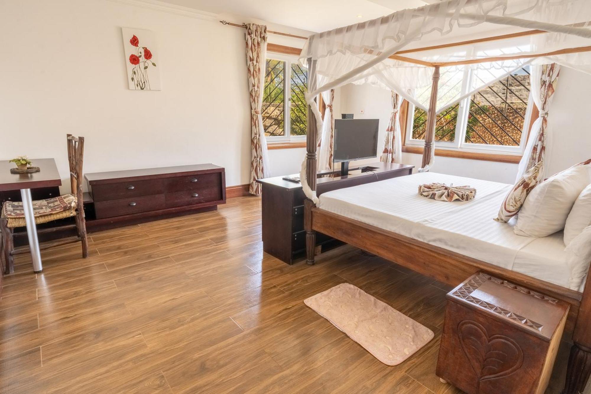 Queens Chateau Boutique Villa เดียนีบีช ภายนอก รูปภาพ