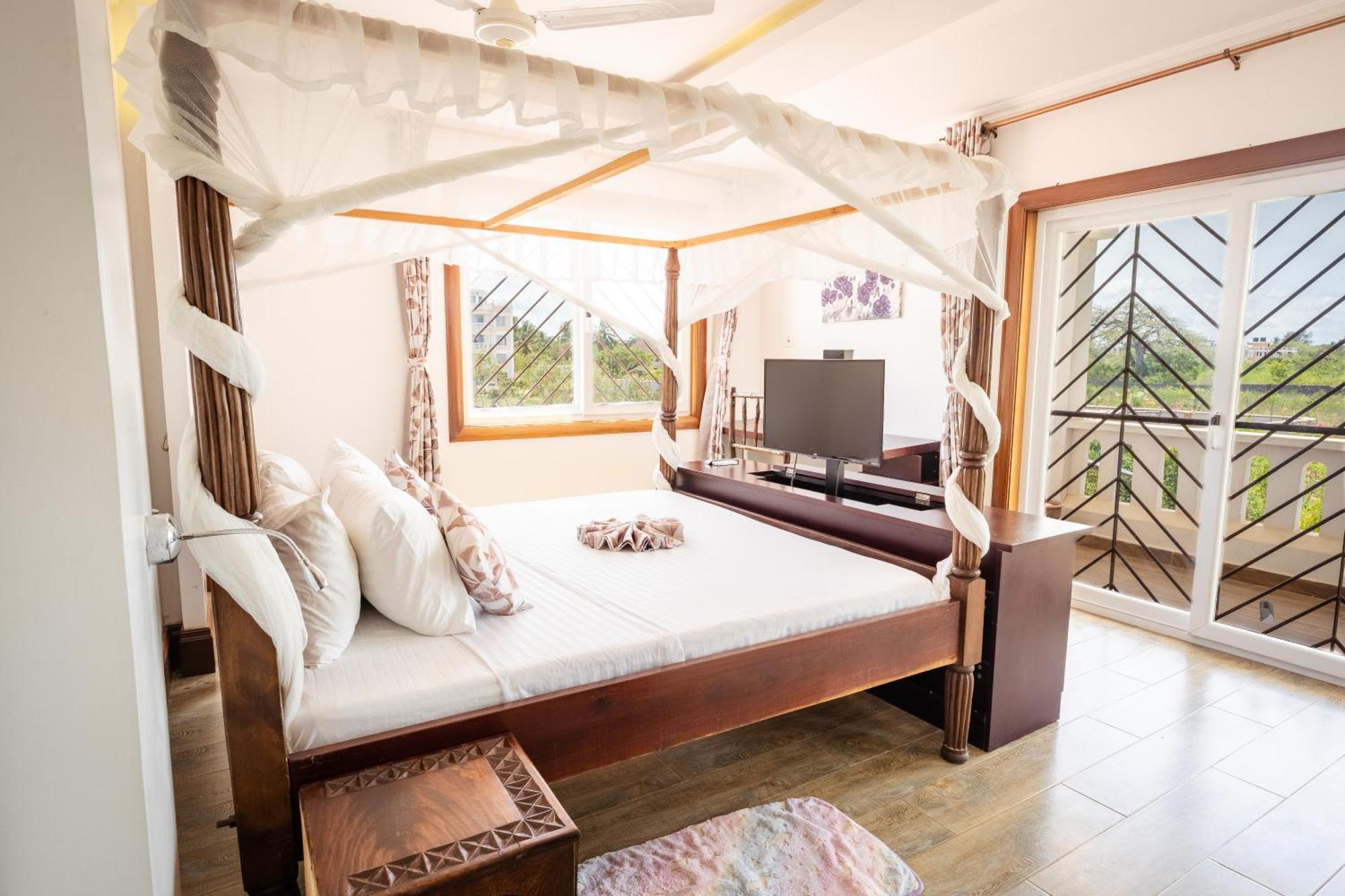 Queens Chateau Boutique Villa เดียนีบีช ภายนอก รูปภาพ
