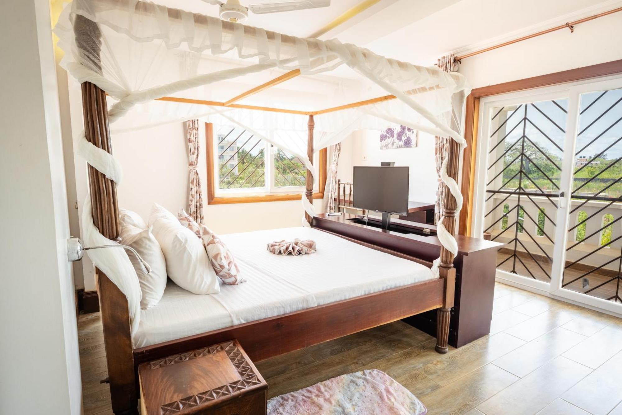 Queens Chateau Boutique Villa เดียนีบีช ภายนอก รูปภาพ